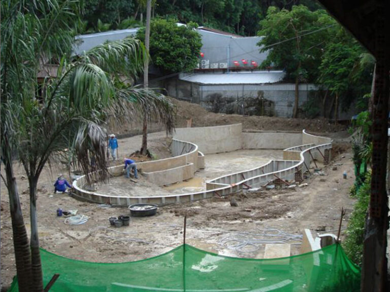 Resort pool with waterfall, L Resort, under construction
