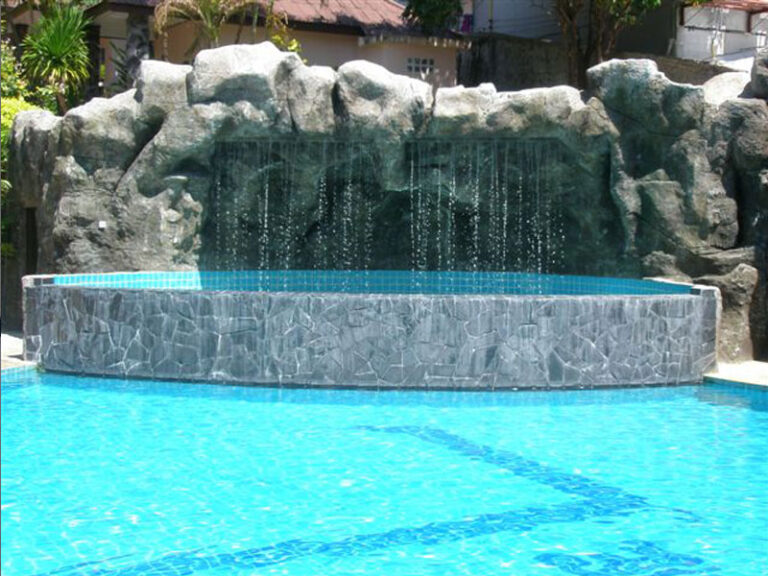 Resort pool with waterfall, L Resort
